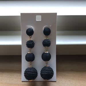 Dangling black-gold earrings